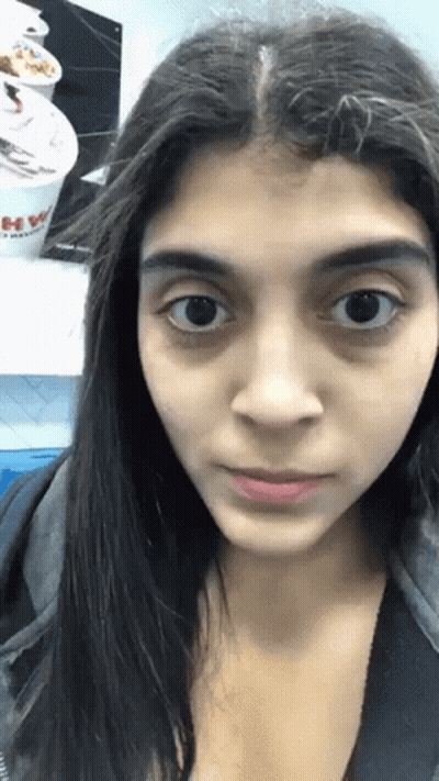 Woman With Yogurt Cup Saying Yogurt GIF