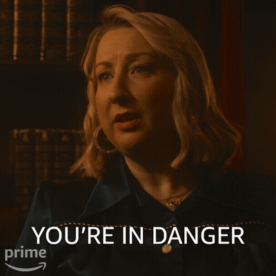 Woman With You're In Danger Text GIF