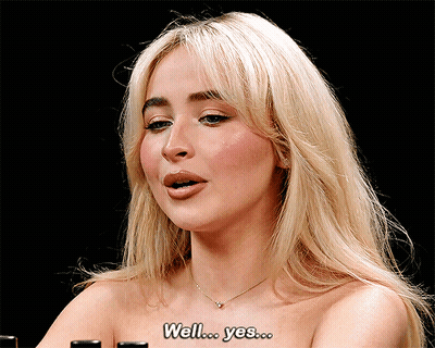 Woman Without Shirt Saying Well Yes GIF