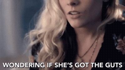 Woman Wondering If She's Got The Guts GIF