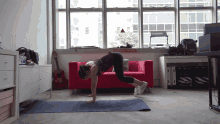 Woman Working Out Burpee Exercise At Home  GIF