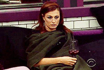 Woman Wrapped In Blanket Holding Wine Glass GIF