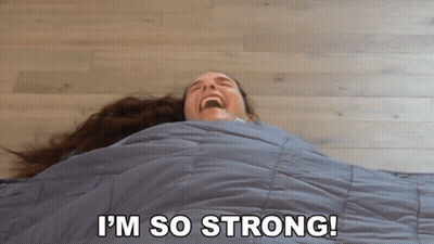 Woman Wrapped In Blanket Saying I'm So Strong GIF