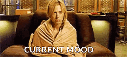 Woman Wrapped In Blanket Sitting On Couch Current Mood GIF