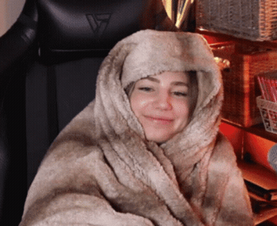 Woman Wrapped in Blanket With Hood