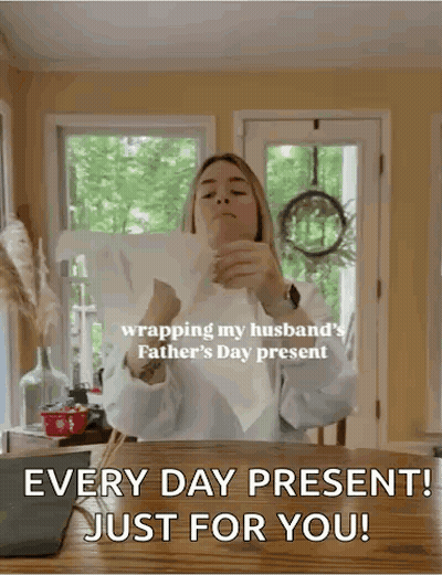 Woman Wrapping Father's Day Present For Husband GIF