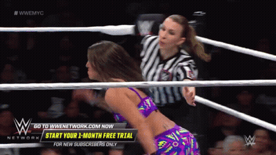 Woman Wrestling Ring With Go To Wnetwork.com Now GIF
