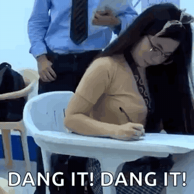 Woman Writing Dang It Dang It At Desk GIF