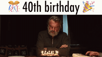 Women Celebrating 40Th Birthday With Cake And Candles GIF