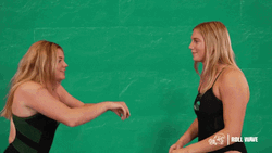 Women Chest Bump Rock Paper Scissors GIF