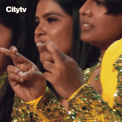 Women Clapping In Front Of Citytv Sign GIF