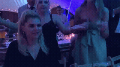 Women Dancing At Party In Tent GIF