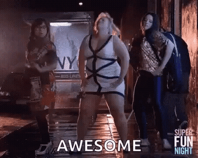 Women Dancing In Dark Alleyway One In White Dress GIF