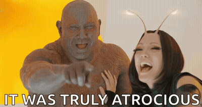 Women Dancing In Front Of Angels Sign GIF