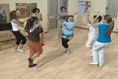 Women Dancing In Room With Sante Force Poster GIF