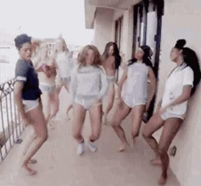 Women Dancing On Balcony GIF