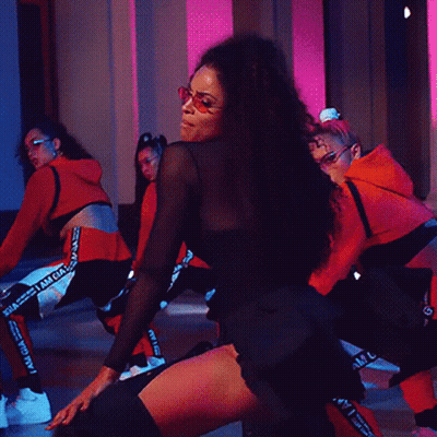 Women Dancing On Stage One In Black Dress GIF