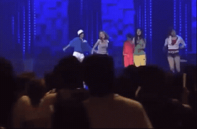 Women Dancing On Stage With Crowd Watching GIF