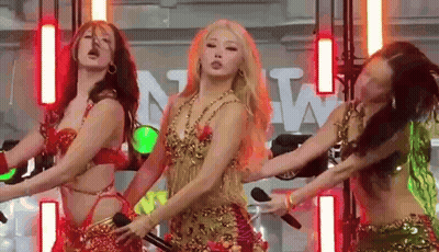 Women Dancing On Stage With Microphone GIF