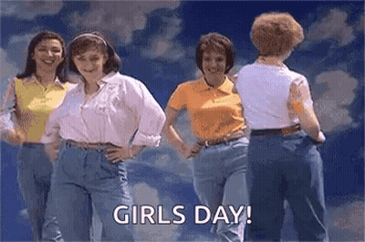 Women Dancing Under Cloudy Sky GIF