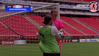 Women Hugging On Soccer Field GIF