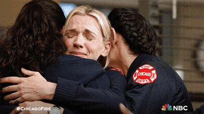 Women Hugging With Chicago Fire Department Patch GIF