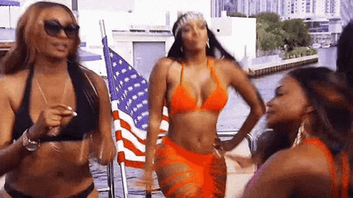 Women In Bikinis Dancing On Boat GIF