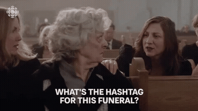 Women In Church Saying What's The Hashtag For This Funeral GIF