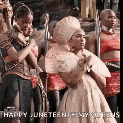 Women In Crowd Holding Spears GIF