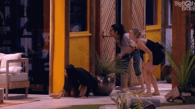 Women In Front Of Big Brother Brasil Building GIF