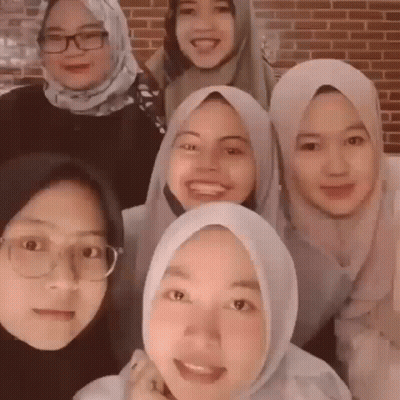 Women In Hijabs Posing GIF