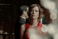 Women In Red Blowing Kisses GIF