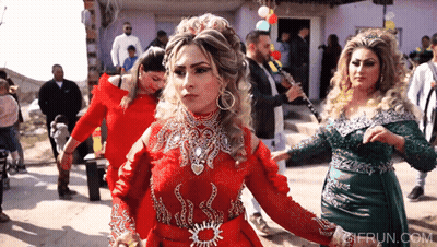 Women In Red Dress Dancing GIF