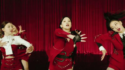 Women In Red Dresses Dancing GIF