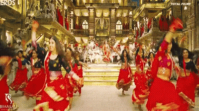 Women In Red Dresses Dancing GIF