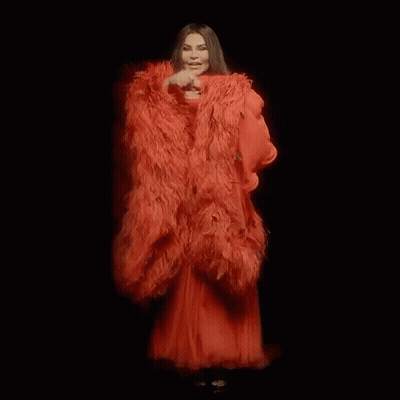 Women In Red Feathered Dresses GIF