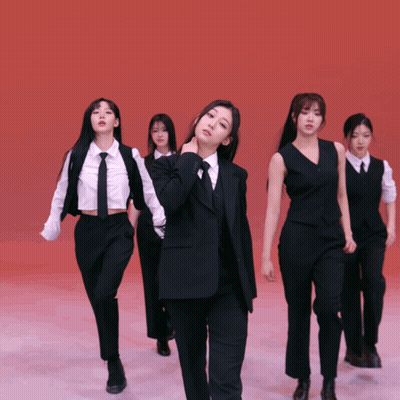 Women In Suits And Ties In Line GIF