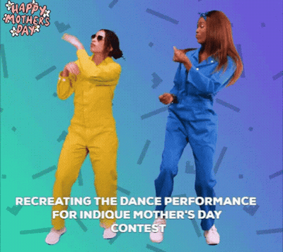 Women In Yellow And Blue Jumpsuits Dancing GIF