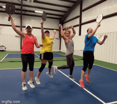 Women Jumping With Tennis Rackets GIF