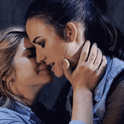 Women Kissing Forehead GIF