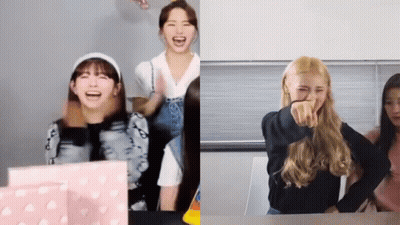 Women Laughing And Pointing At Table GIF