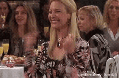 Women Laughing At Table GIF