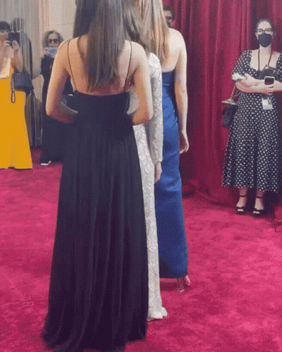 Women On Red Carpet One Wearing Mask GIF