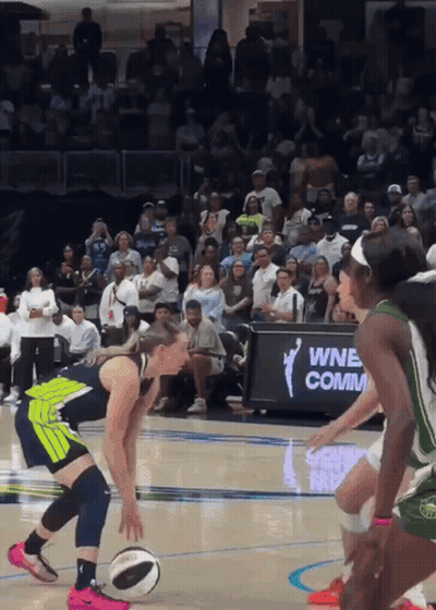 Women Playing Basketball In Front Of A Sign That Says Wnb Comm. GIF