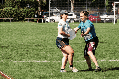 Women Playing Frisbee In Number 32 Shirt GIF