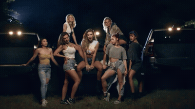 Women Posing On Back Of Pickup Truck GIF