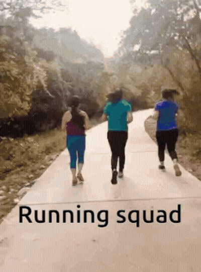 Women Running Down Path With Running Squad GIF