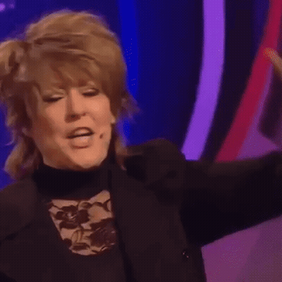 Women Singing Into Microphones GIF
