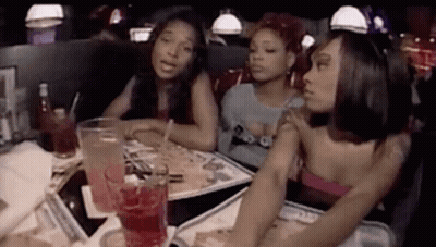Women Sitting At Table Talking GIF