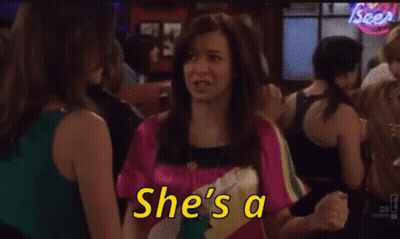 Women Sitting At Table With Arms Up Saying Woooooo GIF